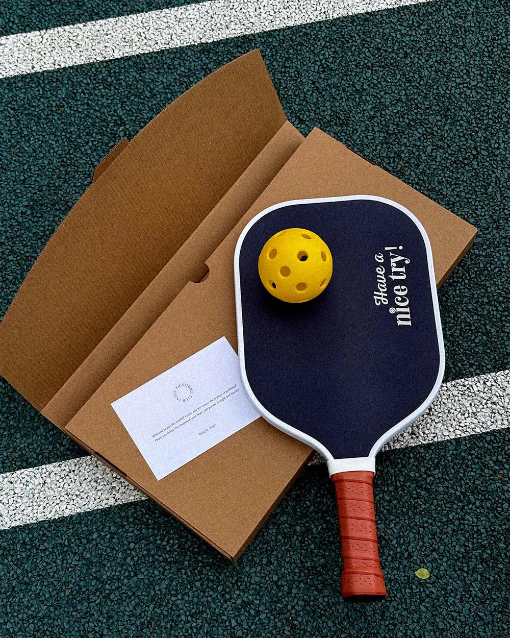 Pickleball paddle gift set with ball, note card, and kraft box