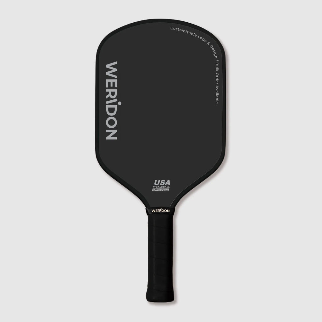 Custom thermoformed carbon fiber pickleball paddle round-top shape on white background