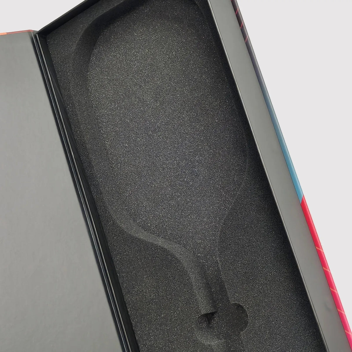 Black custom foam insert shaped to hold a pickleball paddle.