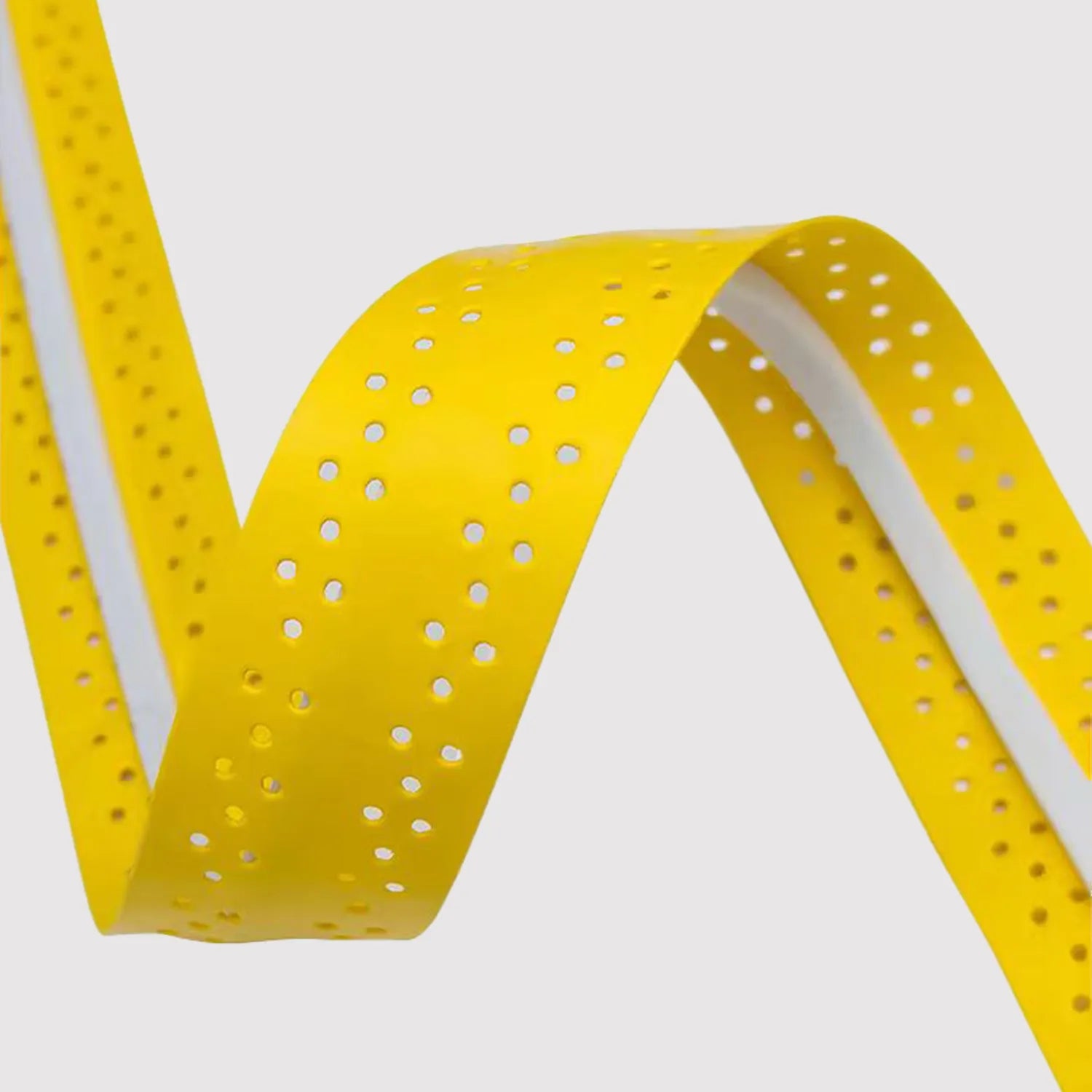 Solid color ribbed overgrip with cushioning strip